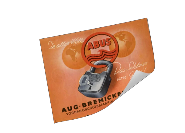 Une affiche orange montrant un cadenas ABUS accroché au logo ABUS, avec l'inscription « Dans le monde entier ! Le cadenas de qualité ! » © ABUS